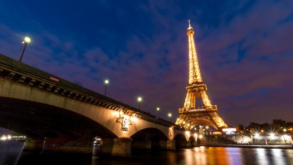 Free paris eiffel tower view from bridge side with background of blue sky and clouds hd travel wallpaper download