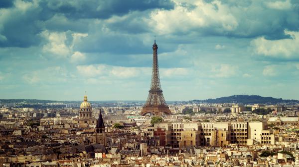 Free paris eiffel tower with background of clouds 4k hd travel wallpaper download