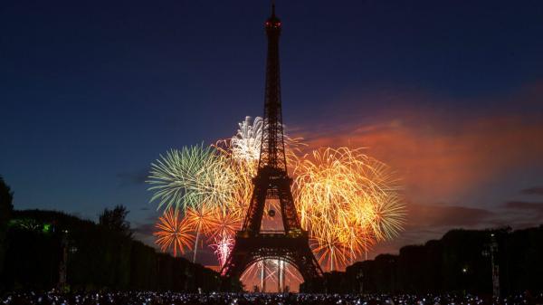 Free paris eiffel tower with background of fireworks and dark sky hd travel wallpaper download