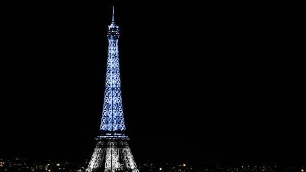 Free paris eiffel tower with blue and white lights with background of black sky during night time 4k 5k hd travel wallpaper download