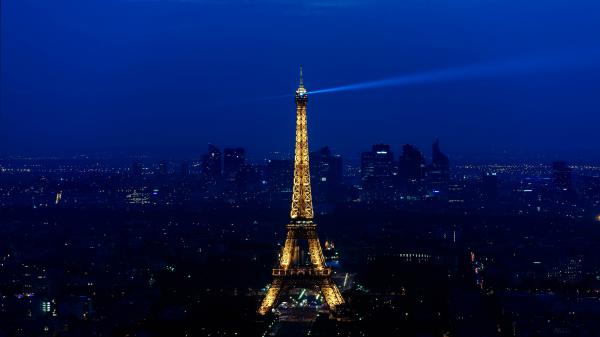 Free paris eiffel tower with blue light on top with blue sky background during night time 4k 5k hd travel wallpaper download