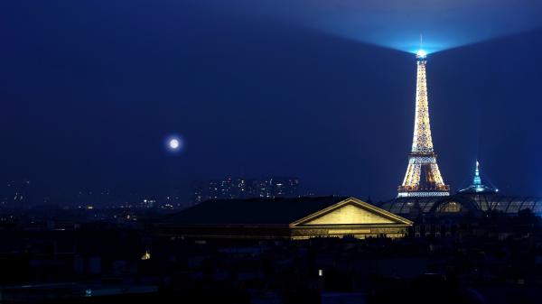 Free paris eiffel tower with lighting background of blue sky and moon during nighttime hd travel wallpaper download