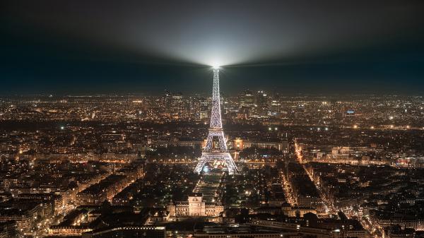 Free paris eiffel tower with white light on top and cityscape with background of dark sky hd travel wallpaper download