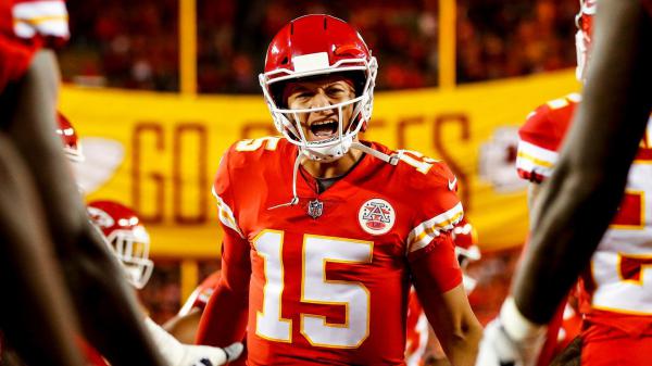 Free patrick mahomes with angry face wearing red sports dress and helmet hd sports wallpaper download