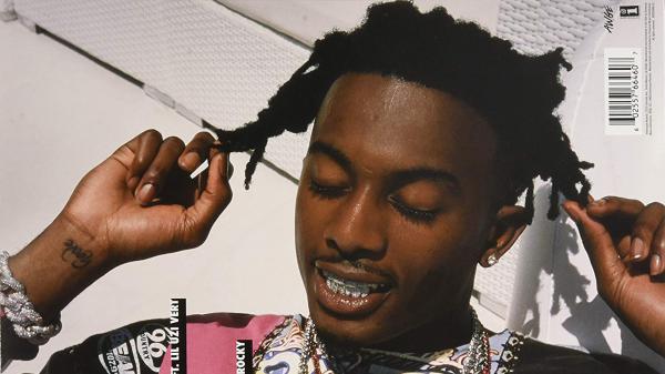 Free playboi carti is closing eyes and touching hair with fingers in white background hd music wallpaper download