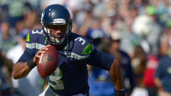 Free russell wilson with shallow background of audience hd seattle seahawks wallpaper download