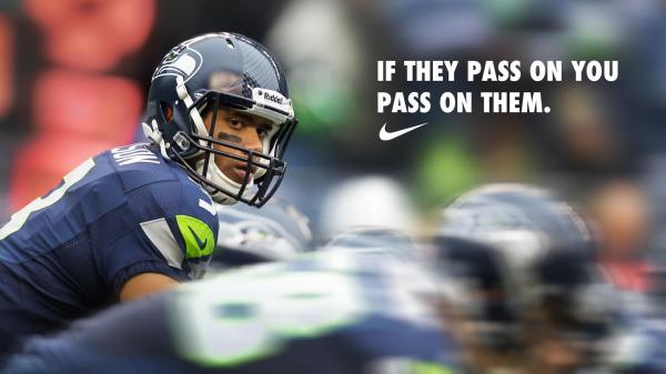 Free seattle seahawks player with blur background hd seattle seahawks wallpaper download