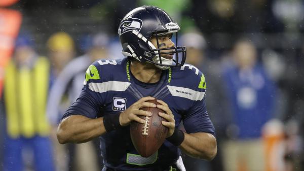 Free seattle seahawks russell wilson with shallow background hd seattle seahawks wallpaper download