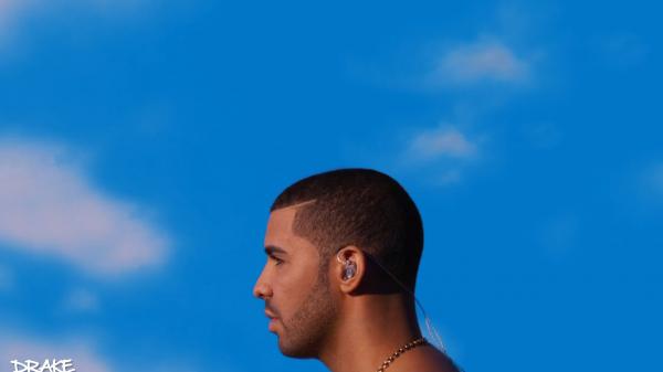 Free side face of drake in blue sky background hd drake wallpaper download