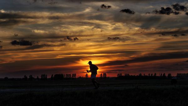 Free silhouette running sunset athlete clouds sky 4k hd wallpaper download