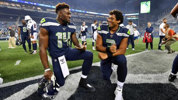 Free smiley metcalf with russell wilson wearing blue sports dress hd dk metcalf wallpaper download