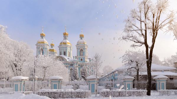 Free snow covered church with fence in russia saint petersburg during winter hd travel wallpaper download