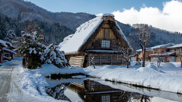 Free snow covered house with reflection on lake and landscape of mountain hd travel wallpaper download