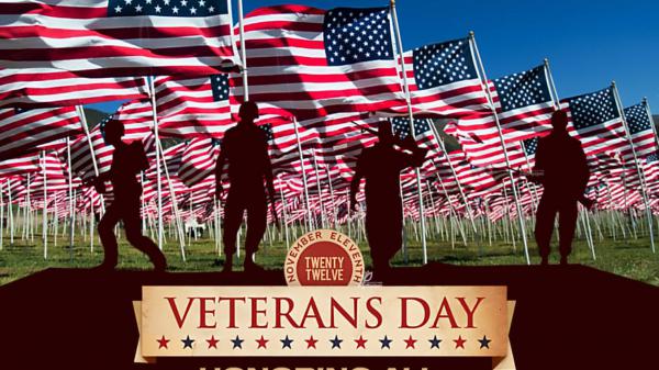 Free soldiers with flags flags under blue sky hd veterans day wallpaper download