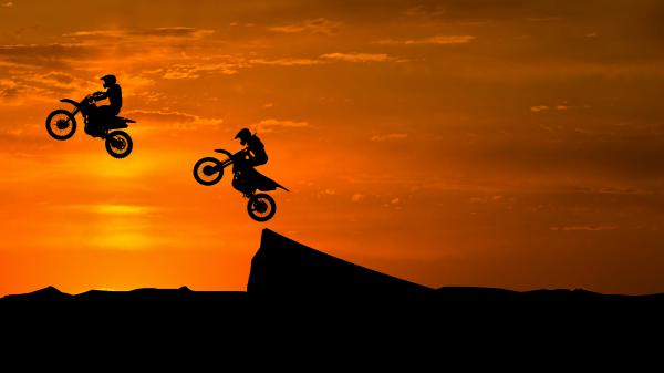 Free stunt bike race sunset silhouette 5k wallpaper download