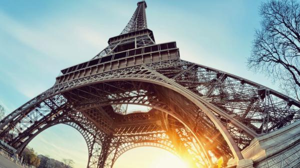 Free upward view of paris eiffel tower with sunbeam hd travel wallpaper download