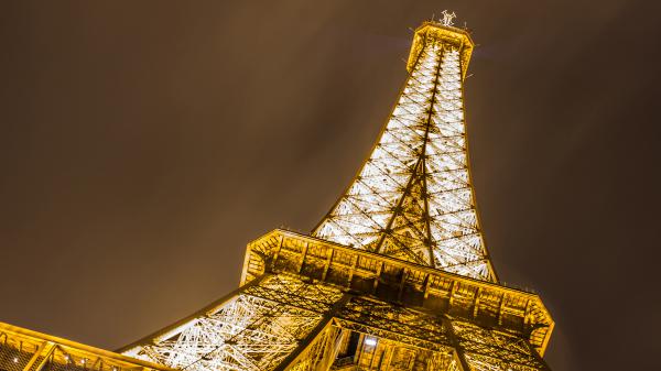 Free upward view of paris eiffel with yellow and white lightings tower 4k hd travel wallpaper download