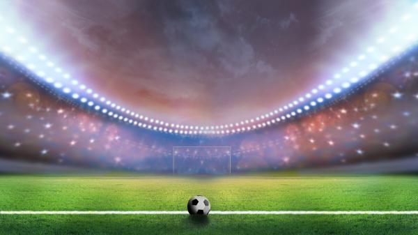 Free white black ball on green grass in lighting background 4k 5k hd football wallpaper download