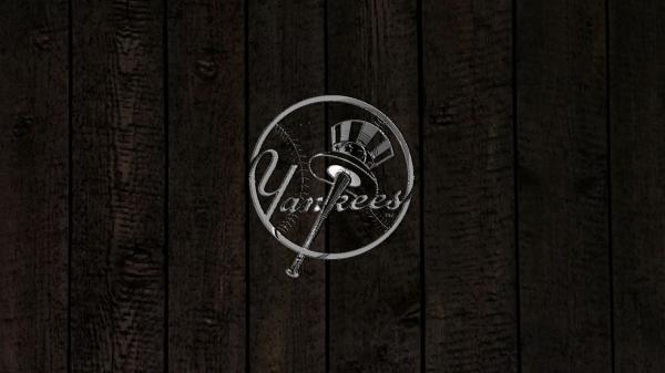 Free yankees logo in brown wall background baseball hd yankees wallpaper download