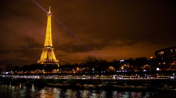 Free yellow lighting paris eiffel tower with purple lights focus from top hd travel wallpaper download